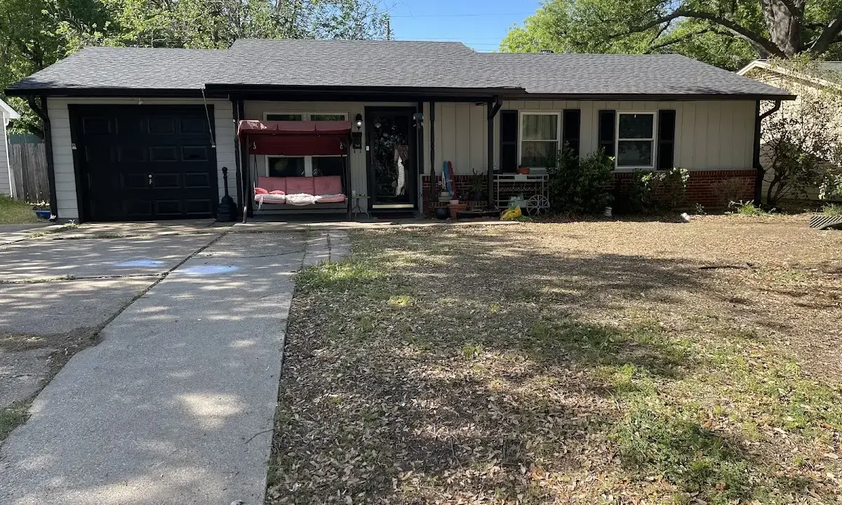 Asphalt Shingle Roof Repair crew at work on a residential roof in Myrtle Grove